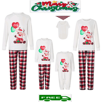 Usklađivanje obiteljske pidžame postavlja božićne PJ -ove s jelenom i kariranom tiskanom majicom dugih rukava